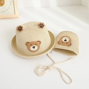 Matching beige woven straw sun hat and bear crossbody bag set for children