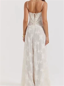 Elegant white strapless maxi dress with butterfly patterns and lace-up back design