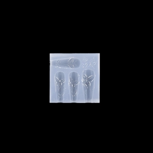 Detailed view of translucent silicone nail art mold featuring 3D butterfly patterns
