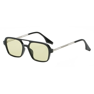 Retro pilot sunglasses with thick black frame and light yellow lenses in a side view