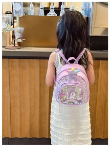 Toddler girl purple unicorn backpack with sequins and silver crown detail on back