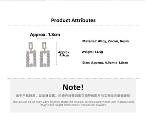 Detail view of rectangular drop earrings with gold finish, cubic zirconia, and dimensions