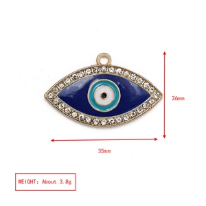 Detail view of Evil Eye pendant dimensions 35mm by 26mm with blue enamel and rhinestones