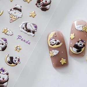 5D embossed panda nail art stickers with moon and stars on a pink base application