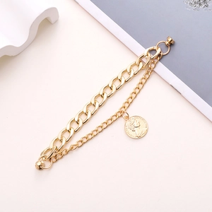 Golden double-layer chain bracelet featuring a Queen Elizabeth II coin pendant charm
