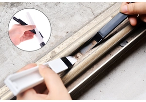 Window track cleaning brush tool with dustpan showing gap and groove scrubbing action