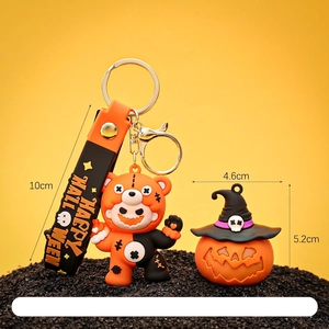 Luminous Halloween bear keychain with pumpkin charm and Happy Halloween wrist strap