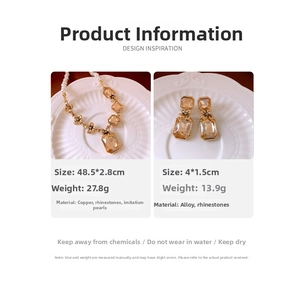 Macro detail of faux pearl and champagne crystal jewelry set with product dimensions