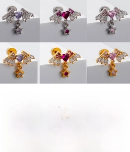 Detail view of heart wing cartilage studs with cubic zirconia and 0.8x6mm bar size