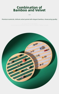 Detailed view of round bamboo jewelry trays with velvet slots for ring display