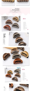 Detailed view of wood grain and tortoise shell hair claw clips for thick hair styles