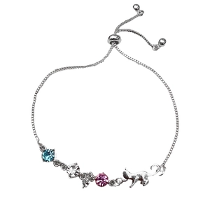 Detailed view of silver charm bracelet with cat pendant and colorful round crystals
