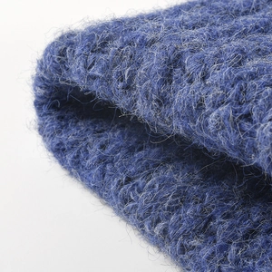 Thick navy blue knitted wool beanie featuring premium mohair texture for winter warmth