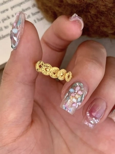Detailed close-up of 24k gold plated copper coin ring in vintage Chinese style