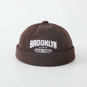 Detail of Brooklyn embroidery and corduroy texture on dark brown toddler docker hat