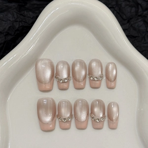 Kit de faux ongles fait main effet œil de chat rose nude avec strass et perles