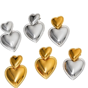 Polished stainless steel double heart earrings in gold, silver, and two-tone finishes