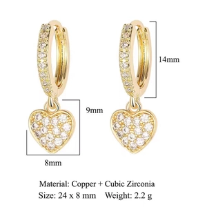 Detail view of gold heart drop earrings with cubic zirconia inlay and measurements