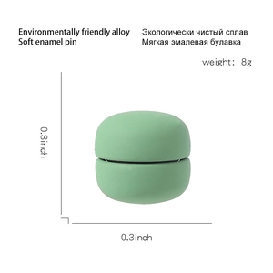 Detail of mint green macaron magnetic brooch made of eco-friendly alloy and soft enamel