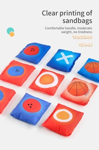 Close-up of red and blue cornhole bean bags with clear sports printing and stitching