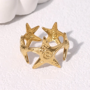 18K gold plated stainless steel open ring featuring five connected starfish designs