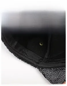 Detail of widened sweatband on wool baseball cap with breathable mesh and sturdy stitching