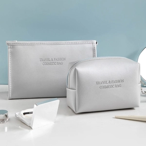 Silver PU leather waterproof travel cosmetic bags in two sizes for makeup storage