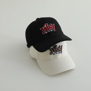 Classic cotton baseball caps in black and off-white with 'Yes' embroidery in a 45-degree view