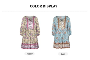Display dei colori degli abiti bohémien gialli e blu con scollo a V e nappe