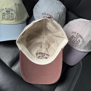 Cute cartoon rabbit embroidery baseball caps in four pastel colors on leather seat