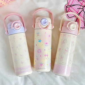 Pastel stainless steel thermal mugs in cream, pink, and purple with straw and strap