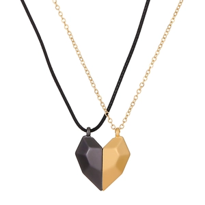 Magnetic matching heart pendant necklace set with matte black and gold finishes