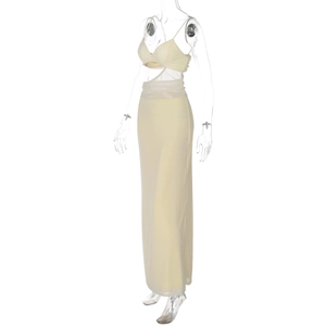 Detail of light yellow hollow-out strap bodice and high-waisted slim maxi dress