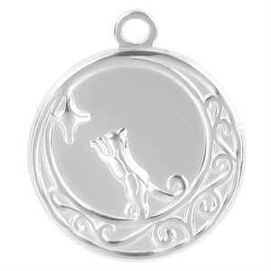 Macro detail of a silver pendant featuring a cat on the moon with stars and cloud patterns