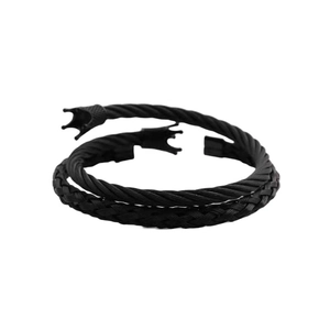 Detail of black twisted steel cable bracelet featuring a matte crown charm design
