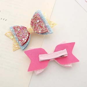 Sparkly sequin and pink felt bow hair clips with metal crocodile grips for girls