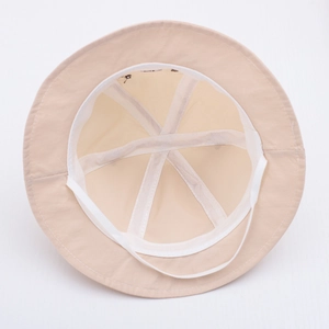 Detail view of baby sun hat interior with breathable mesh and adjustable windproof strap
