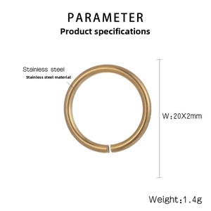Macro detail of 20x2mm brass-colored stainless steel open jump ring for DIY crafts