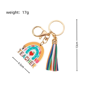 Detail view of rainbow teacher keychain with dimensions, colorful tassel and gold clip