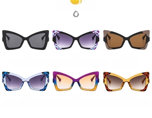 Grid view of butterfly sunglasses in six colors including black and gradient lenses
