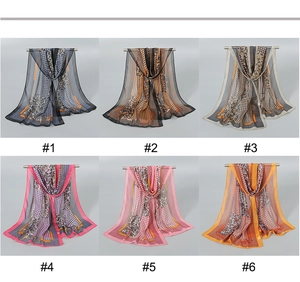 Selection of long chiffon scarves featuring houndstooth, leopard, and chain prints