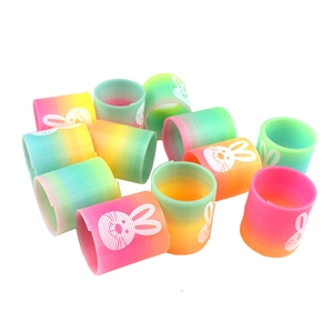Rainbow spring slinky toys with cartoon bunny prints in 12-pack vibrant gradient colors