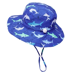 Detail of adjustable windproof strap and shark print on blue quick-dry sun hat