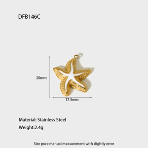 Detail of a white enamel starfish pendant in gold stainless steel with 20mm dimensions