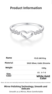 Macro detail of S925 sterling silver heart ring with cubic zirconia inlay specs