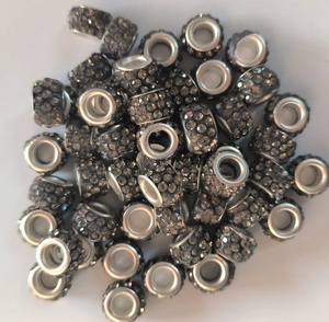 Close-up of 7x12mm dark grey crystal encrusted large hole beads for DIY jewelry making