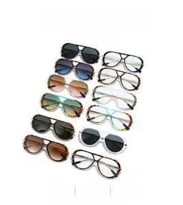 Detailed collection of vintage double-bridge aviator sunglasses in various frame colors