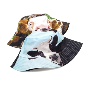 Set of two cow print bucket hats, animal pattern fisherman hats for sun protection.
