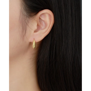 Minimalist gold croissant hoop earrings with elegant textured spiral for women