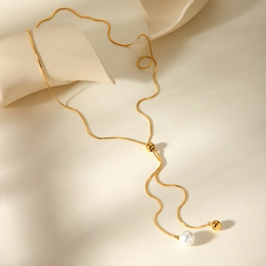 Adjustable gold snake chain necklace with pearl pendant and sliding metal ball bead